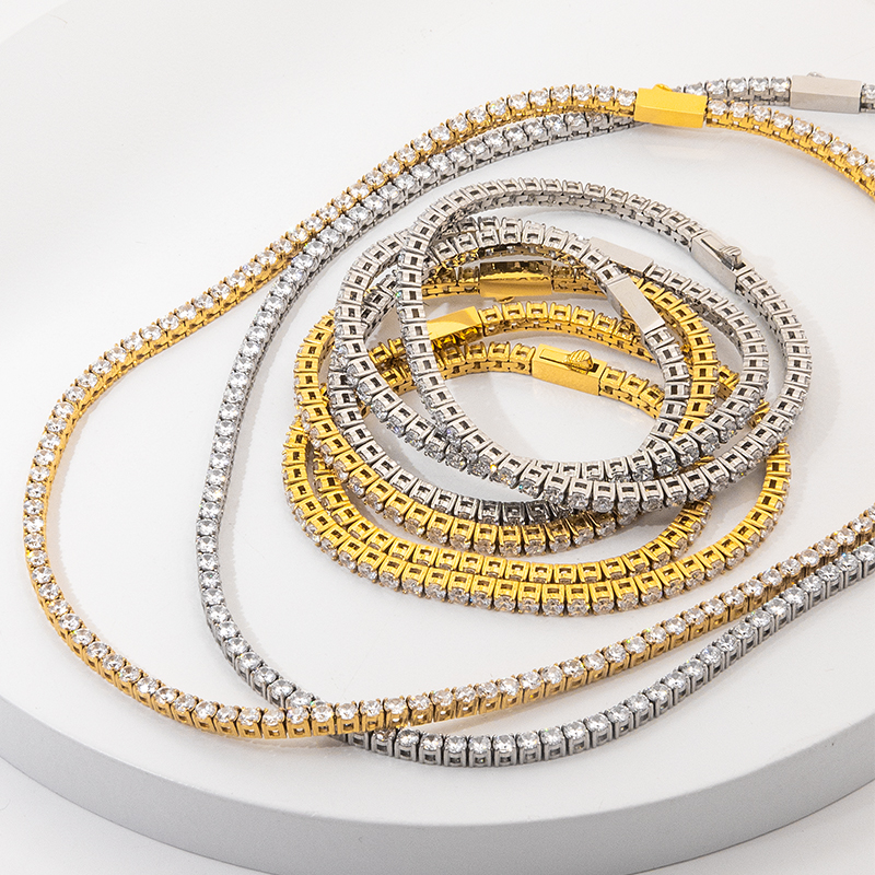 Multiple gold tone stainless steel chain styles